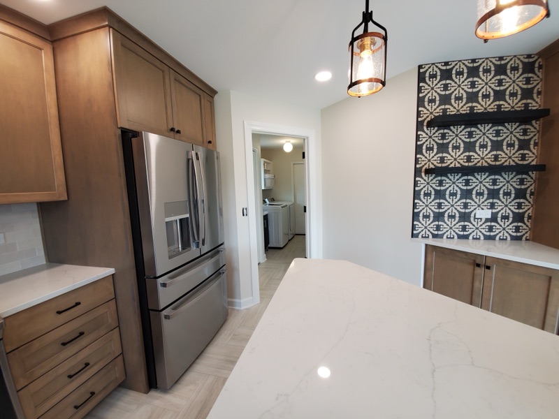 Kitchen cabinet installation with soft-close hinges and custom millwork